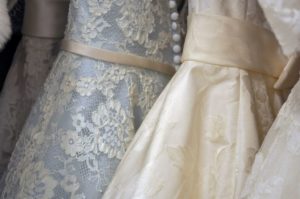 several different wedding dresses ready to buy and try on